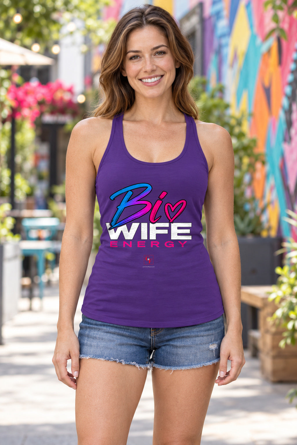 Bi Wife Energy Racerback Tank in Purple Rush, woman wearing the tank in a lifestyle setting