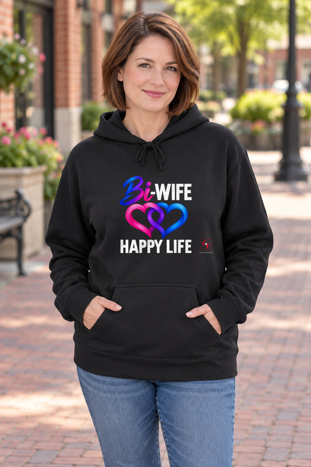 Bi Wife Happy Life Hoodie in Black on a model outdoors — Common Flavor