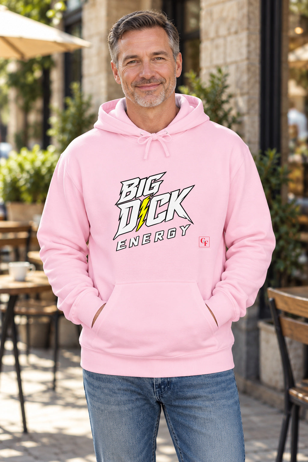Big Dick Energy Hoodie in Light Pink on a model outdoors — Common Flavor