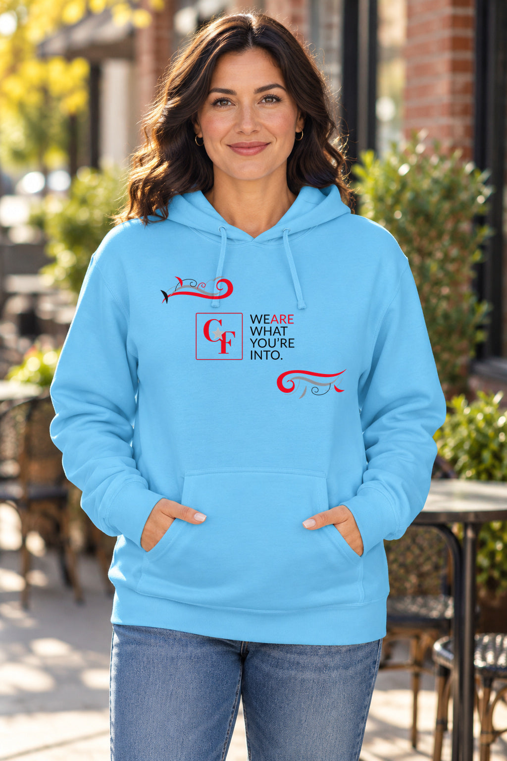 CF Originals "We Are What You're Into" Flowing Twist Hoodie in Sky on a model outdoors — Common Flavor