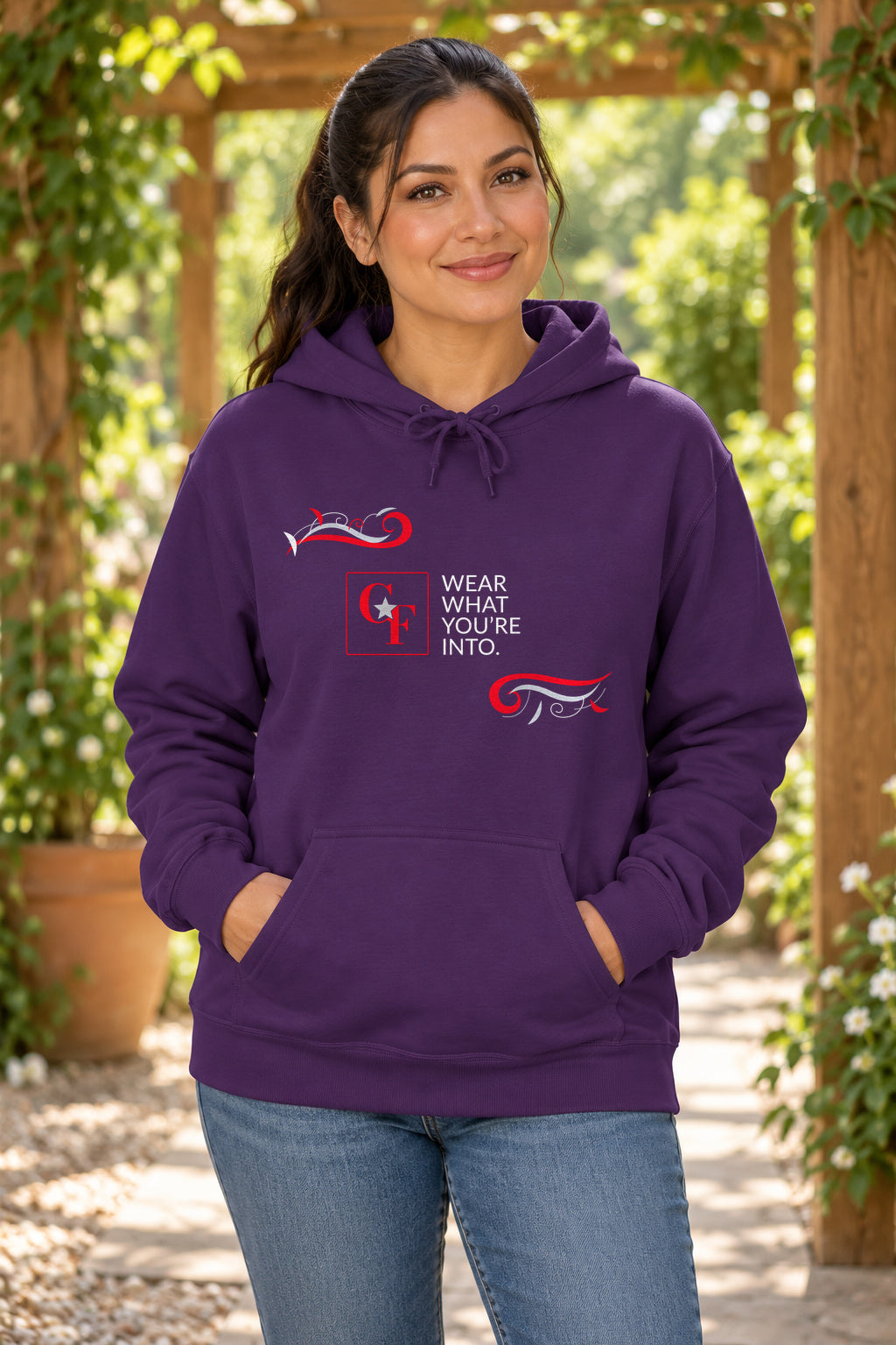 CF Originals "Wear What You're Into" Flowing Twist Hoodie in Purple on a model outdoors — Common Flavor