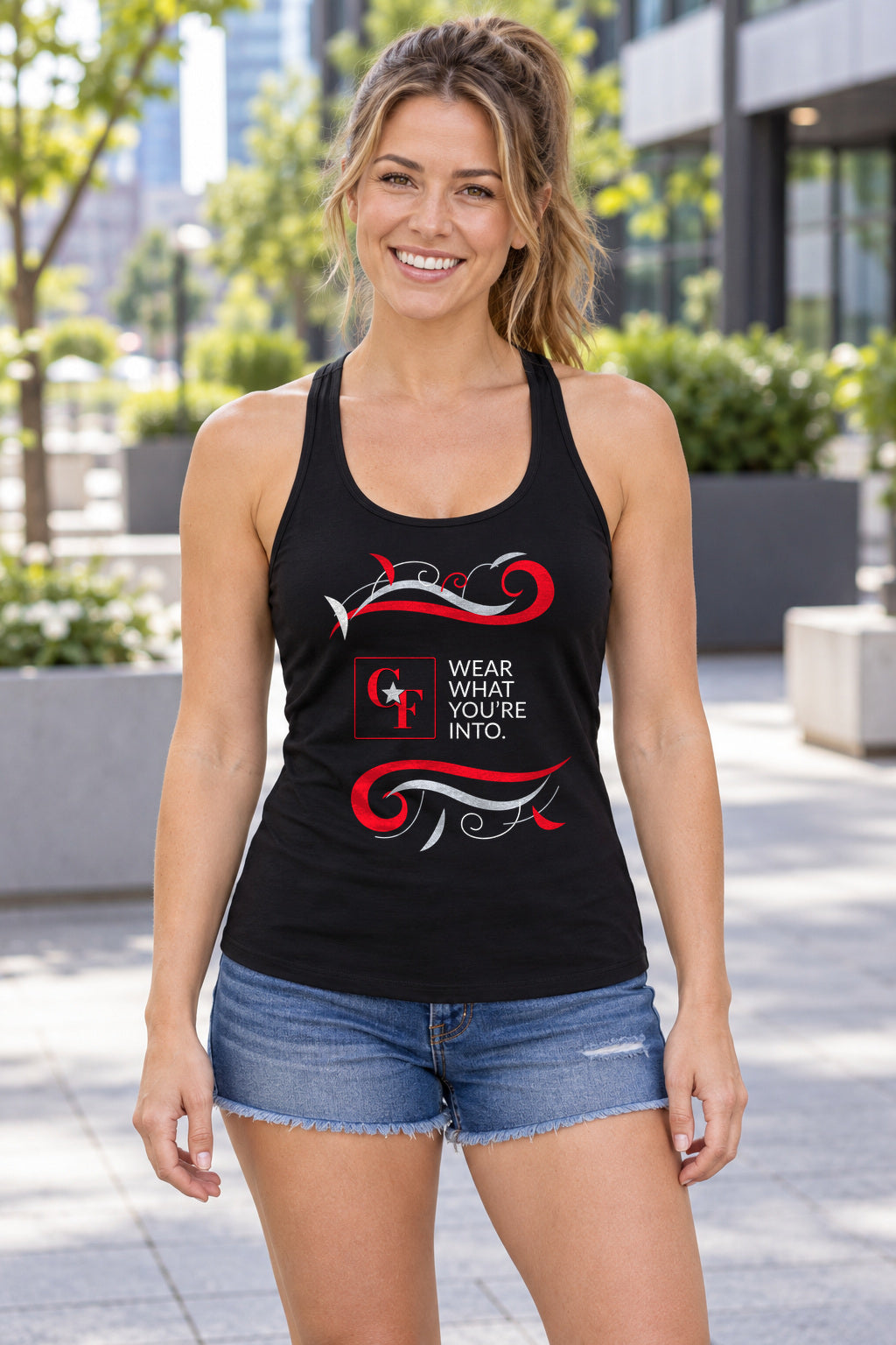 CF Originals "Wear What You're Into" Flowing Twist Racerback Tank in Black, woman wearing the tank in a lifestyle setting