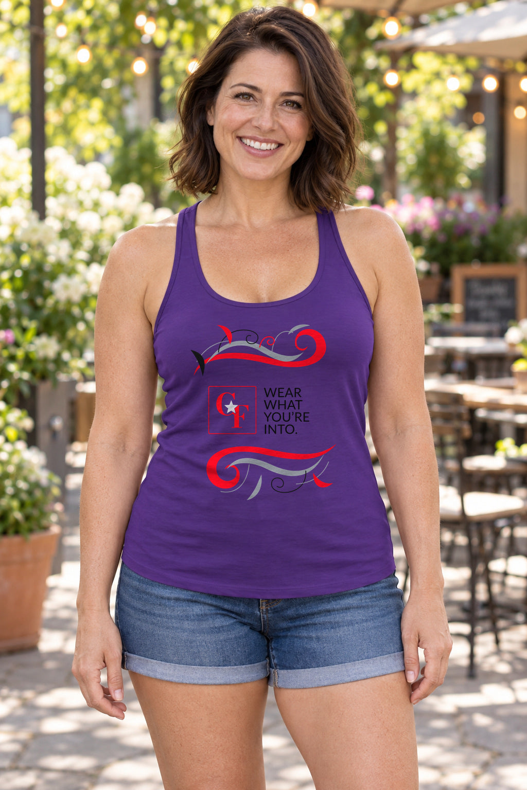 CF Originals "Wear What You're Into" Flowing Twist Racerback Tank in Purple Rush, woman wearing the tank in a lifestyle setting