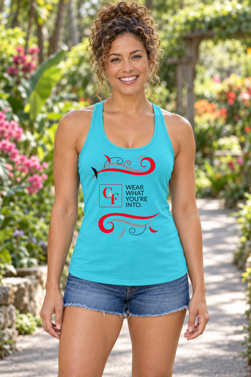 CF Originals "Wear What You're Into" Flowing Twist Racerback Tank in Tahiti Blue, woman wearing the tank in a lifestyle setting