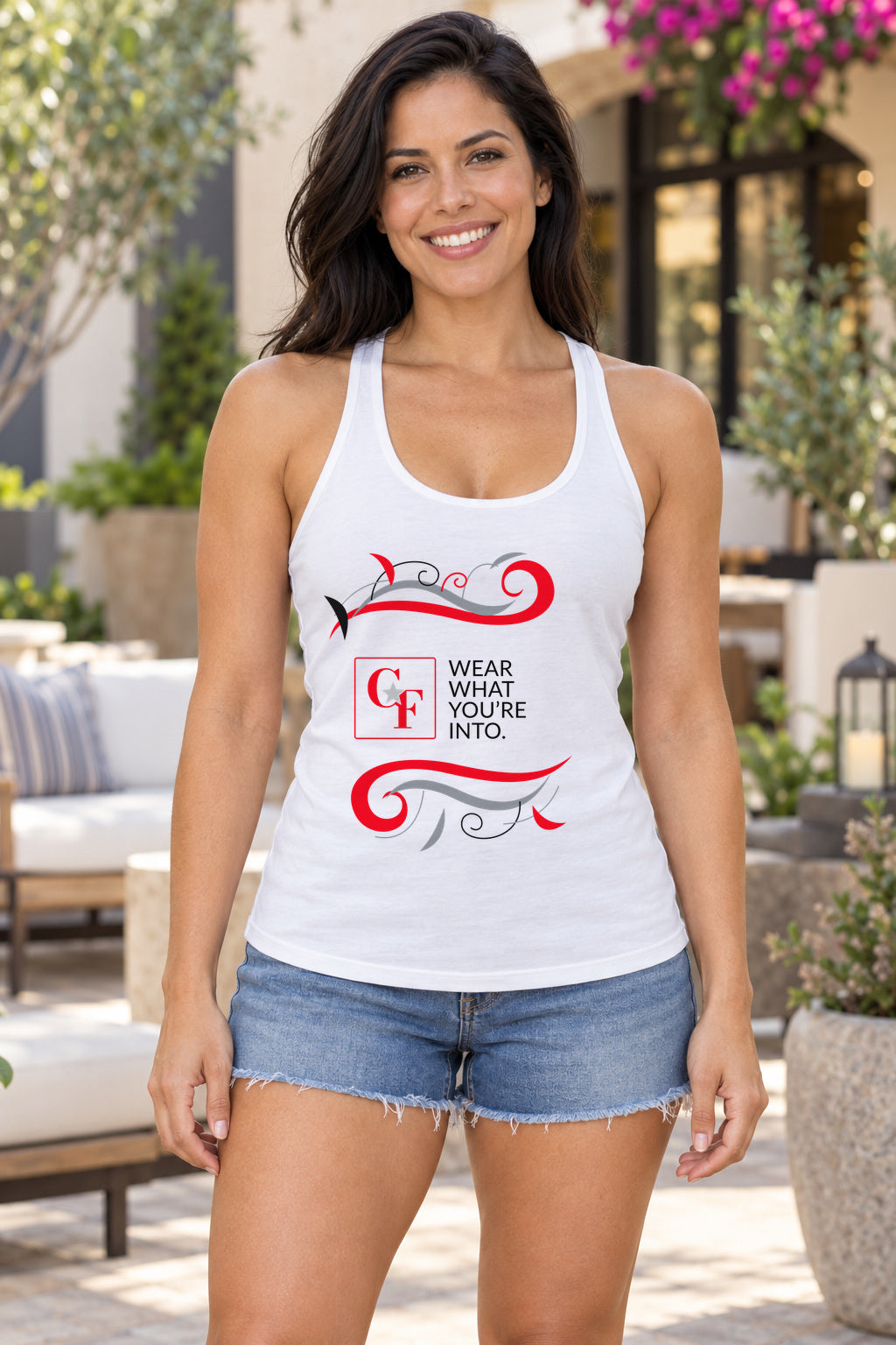 CF Originals "Wear What You're Into" Flowing Twist Racerback Tank in White, woman wearing the tank in a lifestyle setting