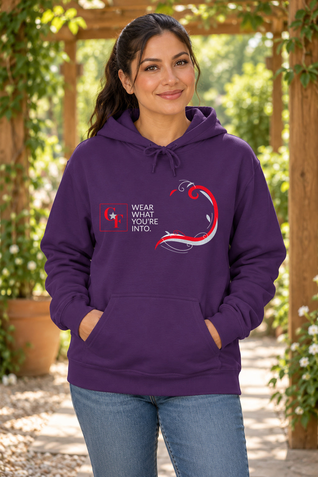 Common Flavor Originals "Wear What You're Into" Side Sweep Hoodie in Purple on a model outdoors — Common Flavor