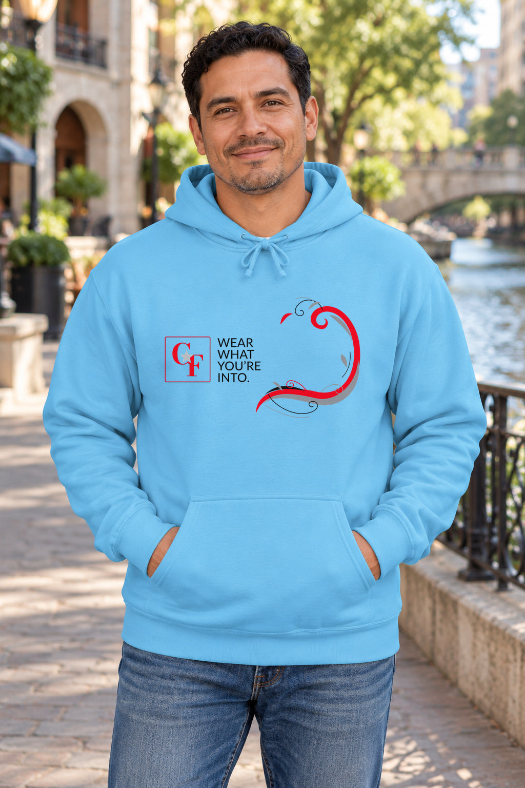 Common Flavor Originals "Wear What You're Into" Side Sweep Hoodie in Sky on a model outdoors — Common Flavor