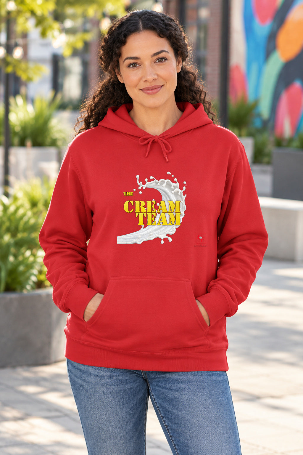 Cream Team Original Refresh Hoodie in Red on a model outdoors — Common Flavor