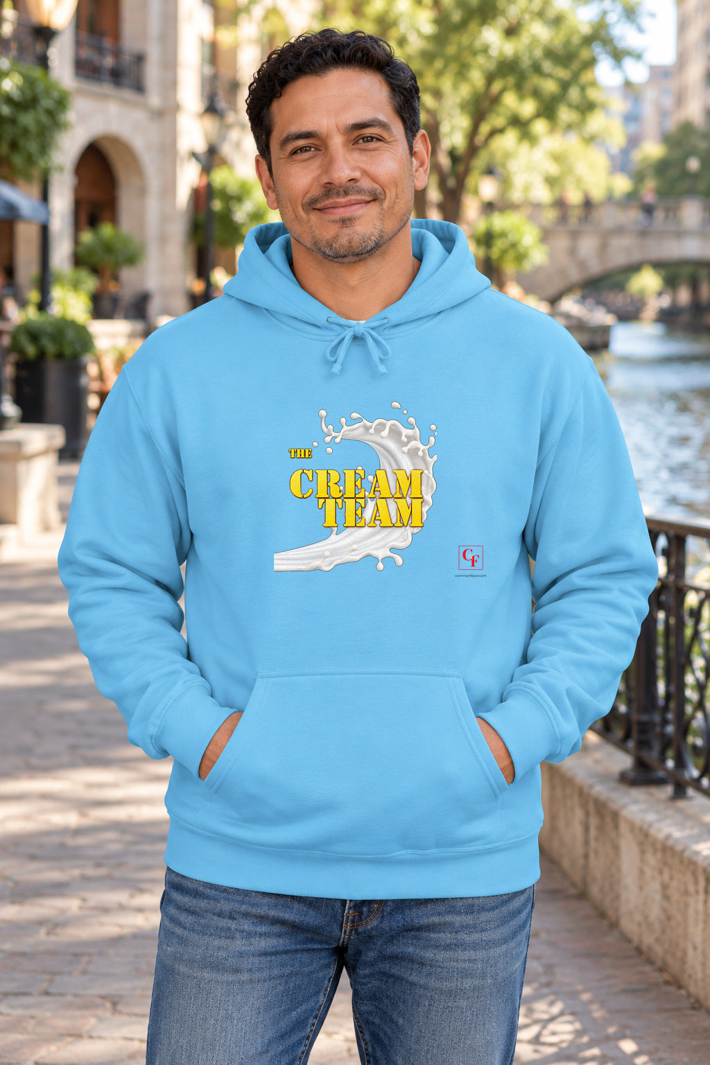 Cream Team Original Refresh Hoodie in Sky on a model outdoors — Common Flavor