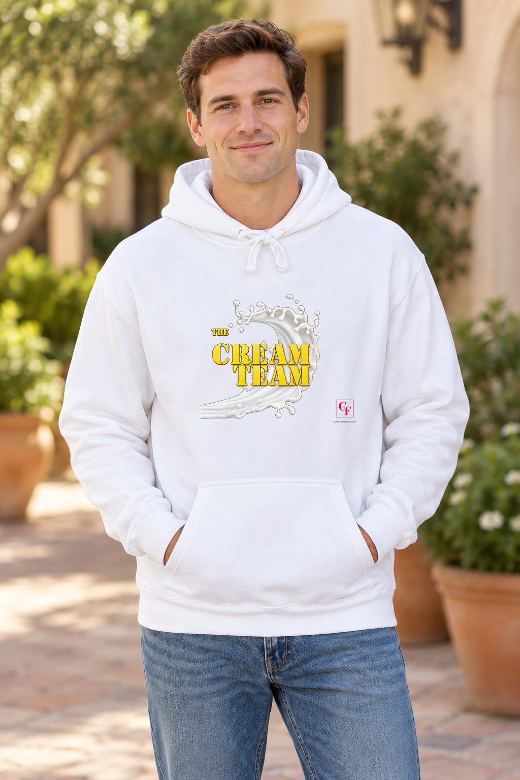 Cream Team Original Refresh Hoodie in White on a model outdoors — Common Flavor