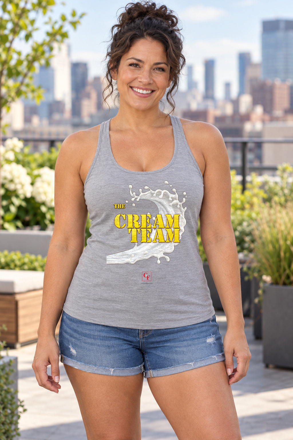 Cream Team Original Refresh Racerback Tank in Heather Grey, woman wearing the tank in a lifestyle setting