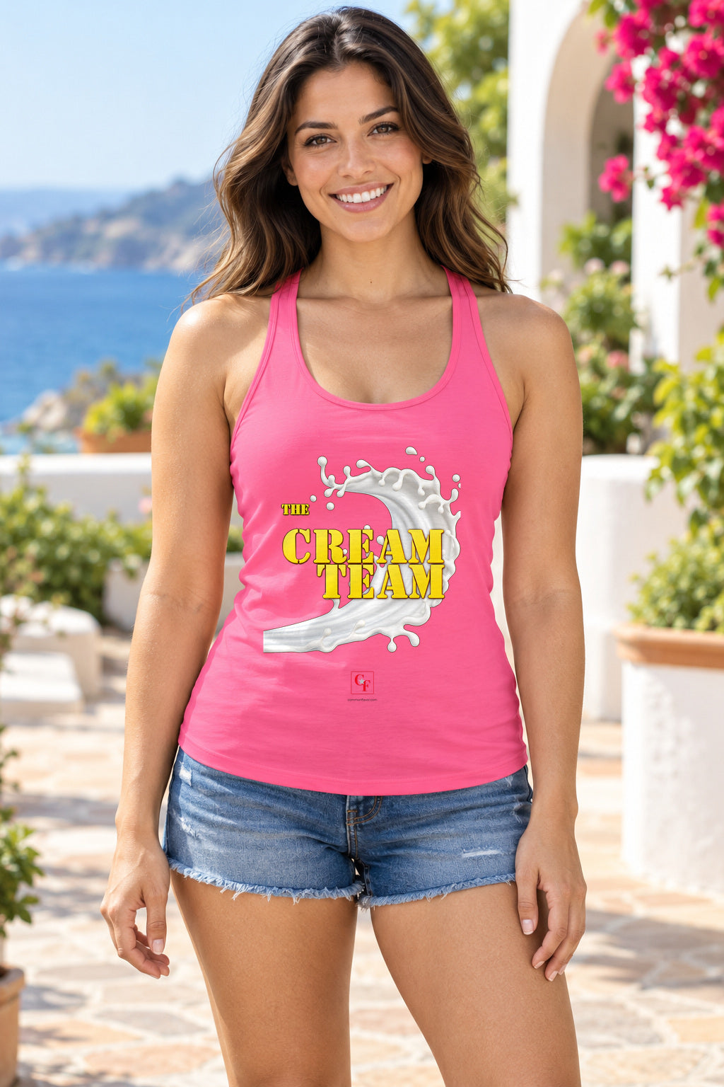 Cream Team Original Refresh Racerback Tank in Hot Pink, woman wearing the tank in a lifestyle setting