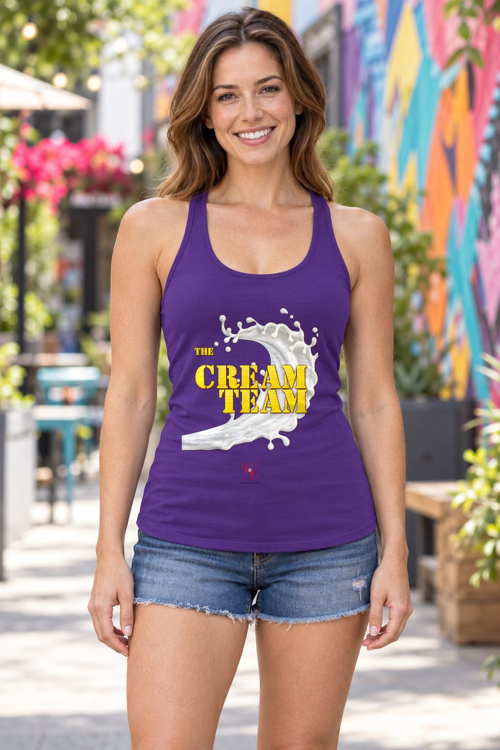 Cream Team Original Refresh Racerback Tank in Purple Rush, woman wearing the tank in a lifestyle setting