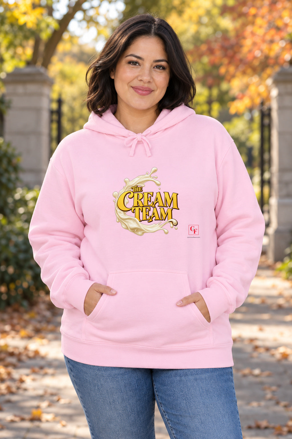 Cream Team Splash Hoodie in Light Pink on a model outdoors — Common Flavor