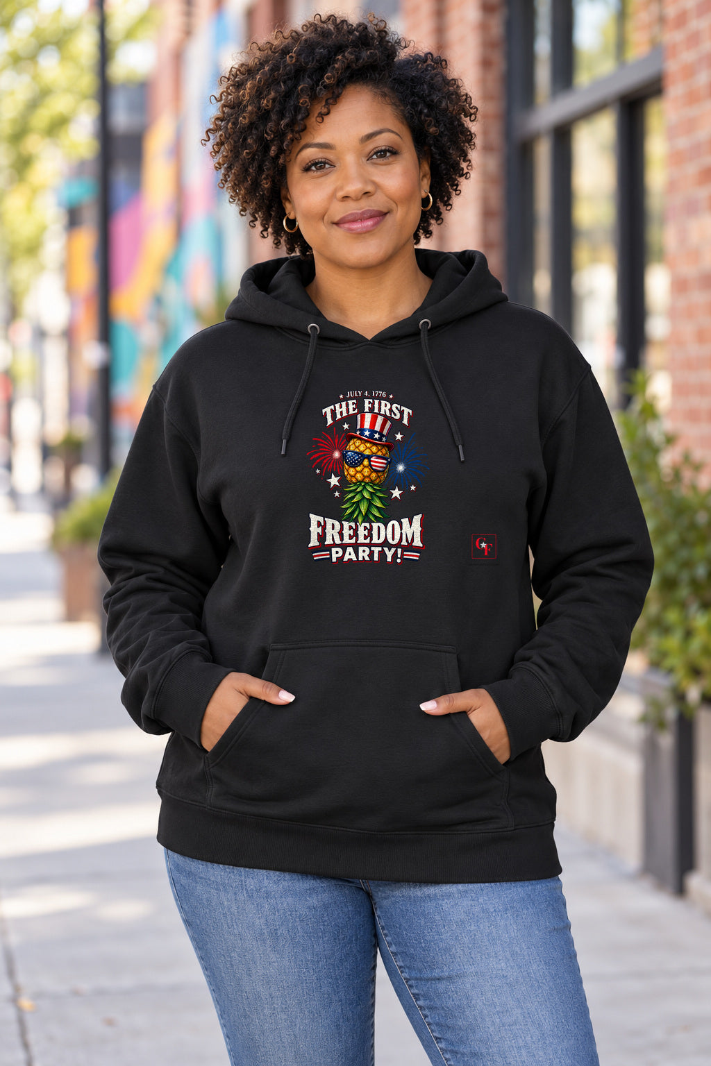 First Freedom Party Hoodie in Black on a model outdoors — Common Flavor