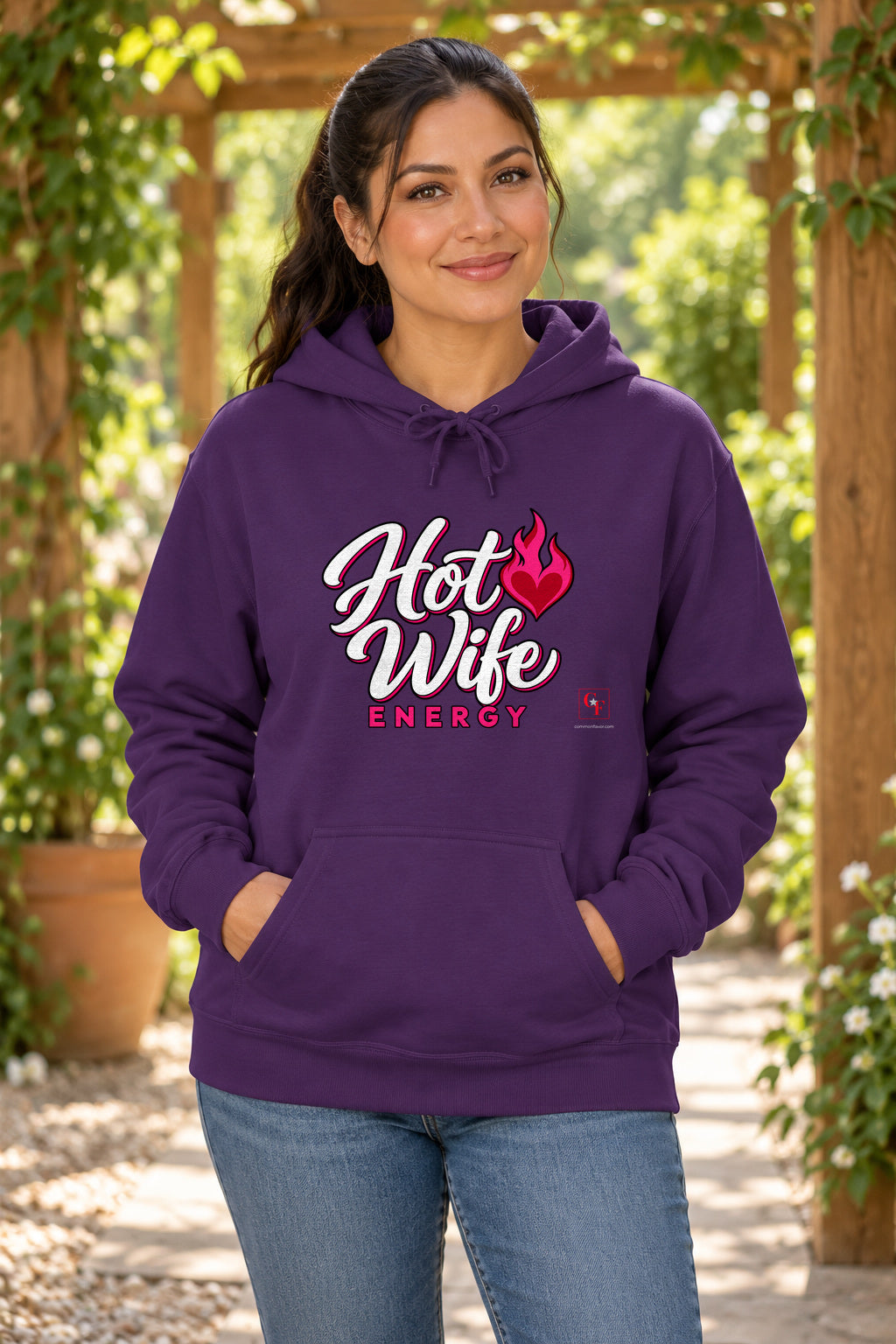 Hot Wife Energy Hoodie in Purple on a model outdoors — Common Flavor