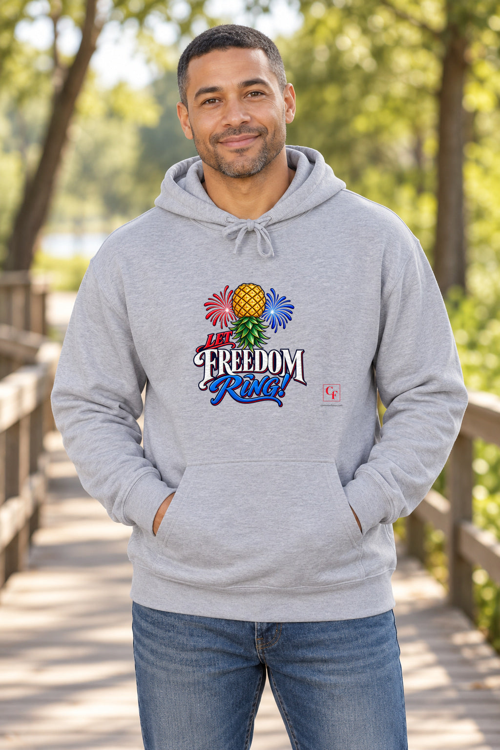 Let Freedom Ring Hoodie in Sport Grey on a model outdoors — Common Flavor