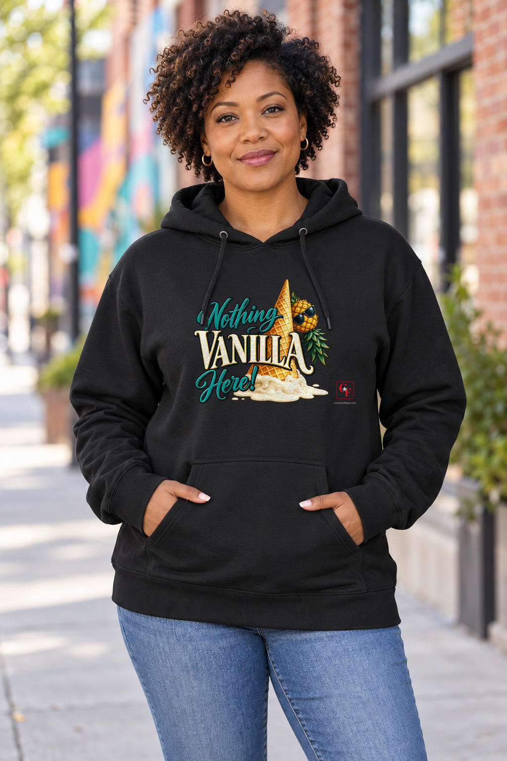 Nothing Vanilla Here Hoodie in Black on a model outdoors — Common Flavor
