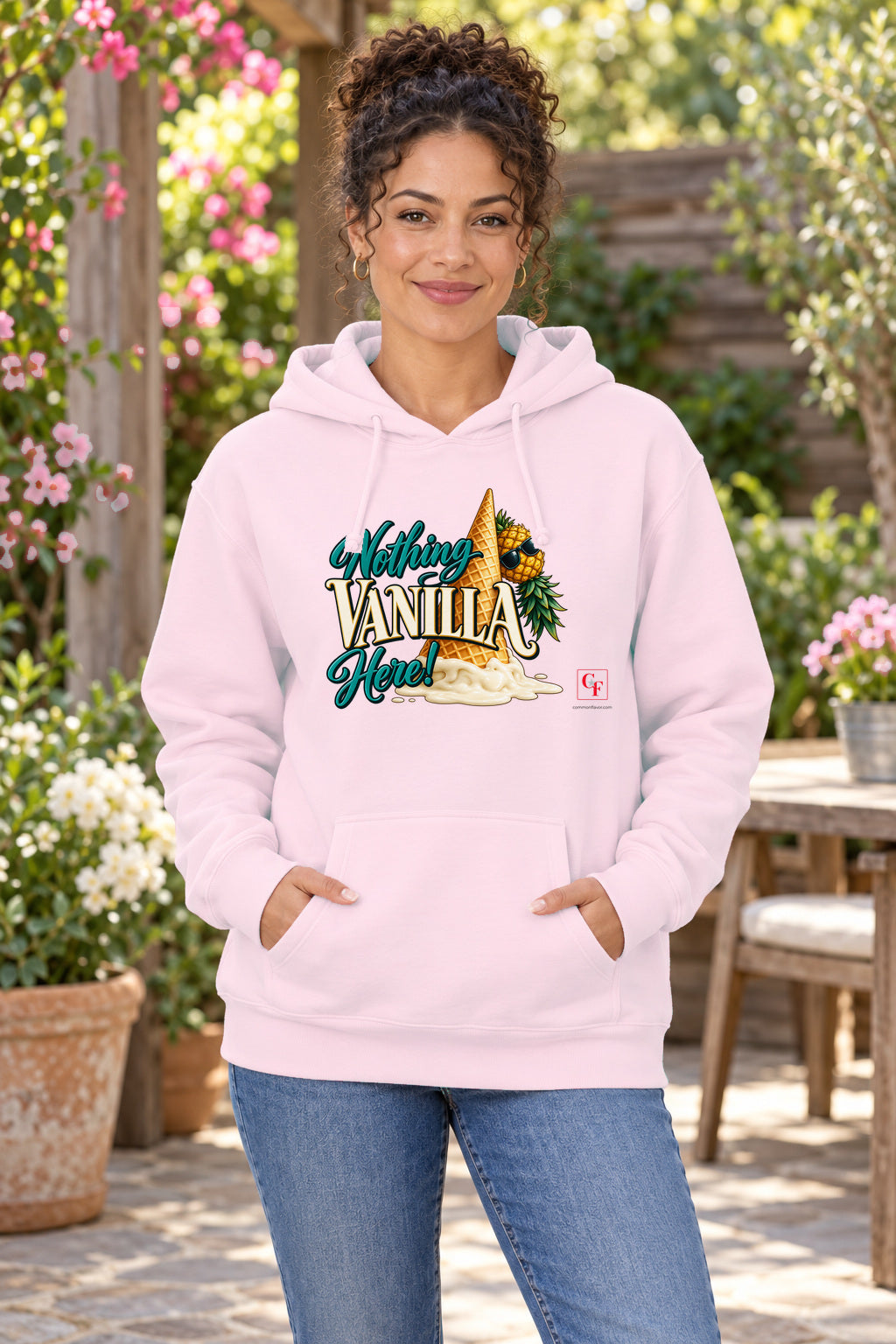 Nothing Vanilla Here Hoodie in Light Pink on a model outdoors — Common Flavor