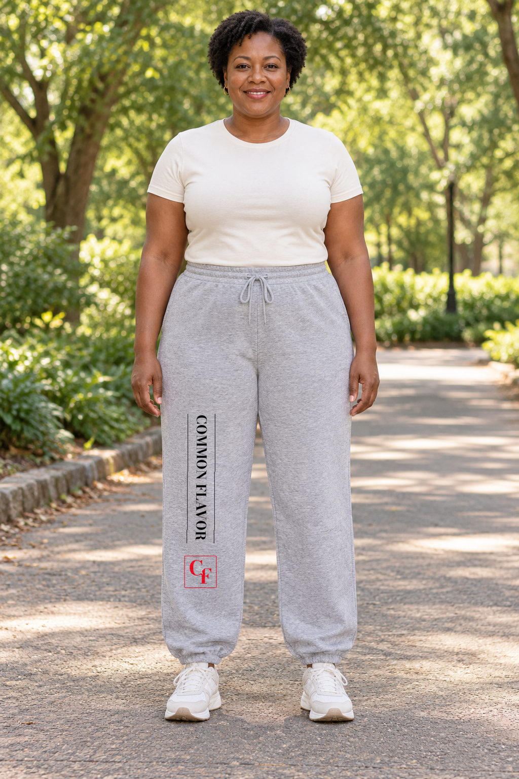 Model wearing Sport Grey Common Flavor Classic Signature sweatpants outdoors