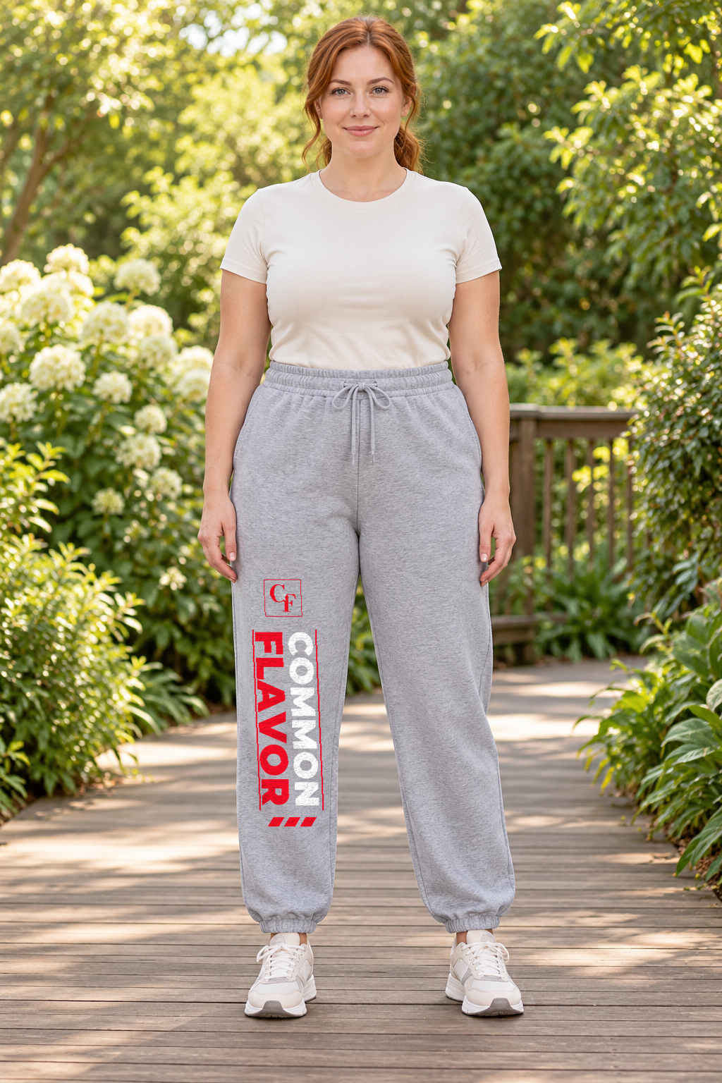 Model wearing Sport Grey Common Flavor Sport Track sweatpants outdoors