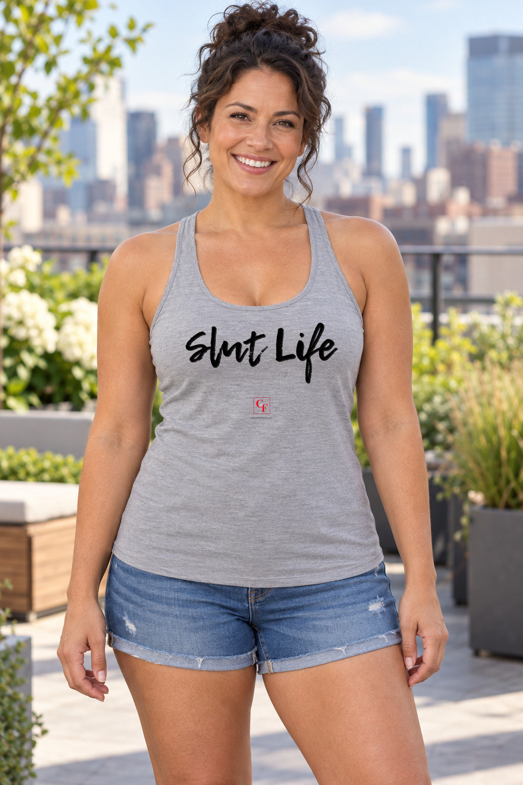 Slut Life Racerback Tank in Heather Grey, woman wearing the tank in a lifestyle setting