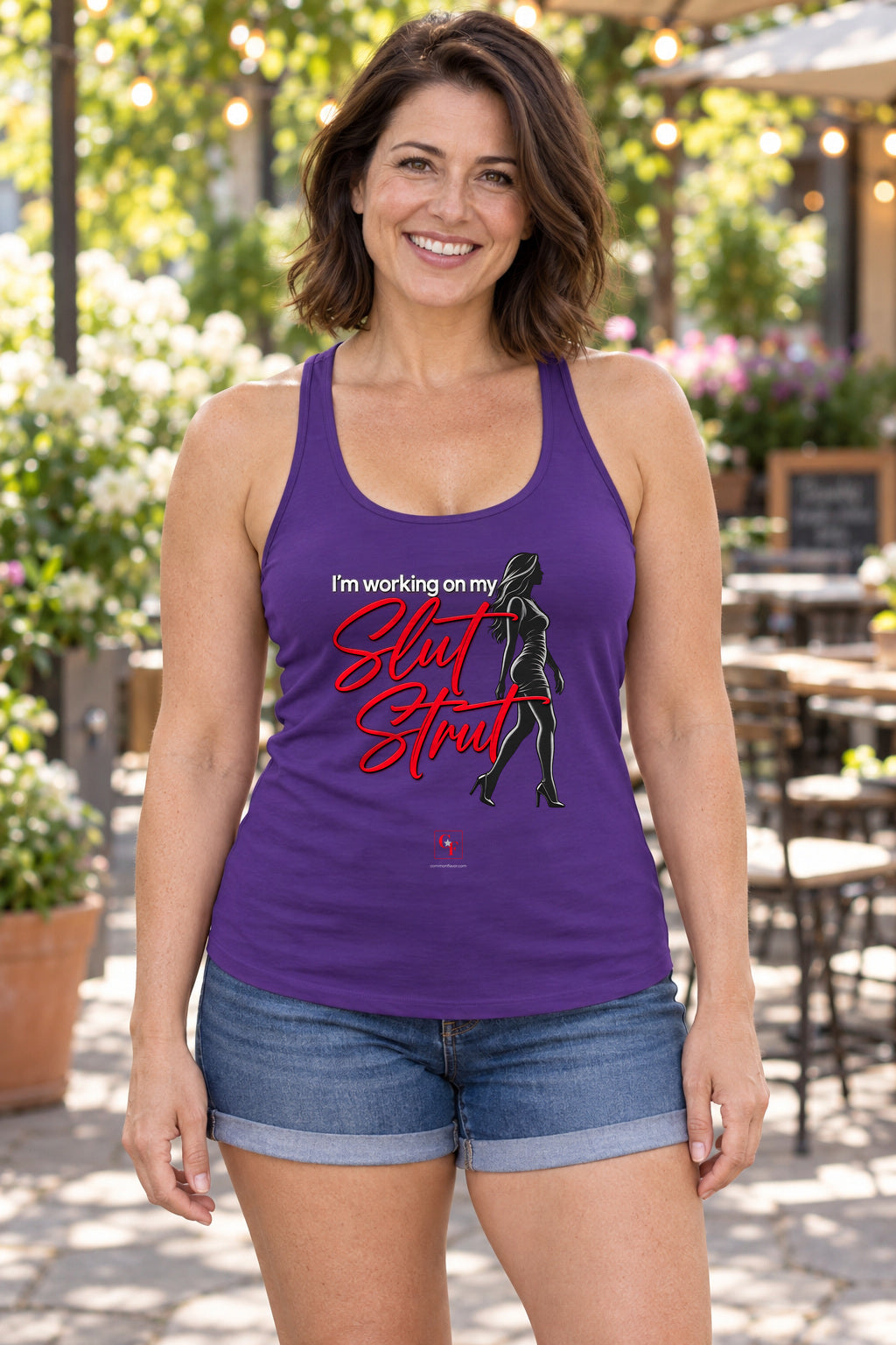 Slut Strut Racerback Tank in Purple Rush, woman wearing the tank in a lifestyle setting