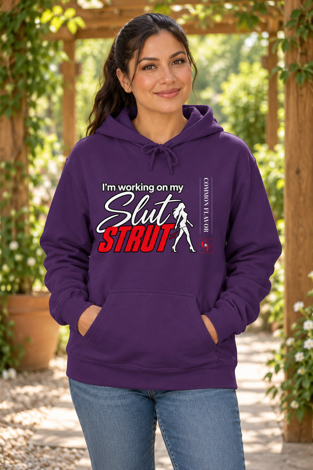 Slut Strut Variation Hoodie in Purple on a model outdoors — Common Flavor