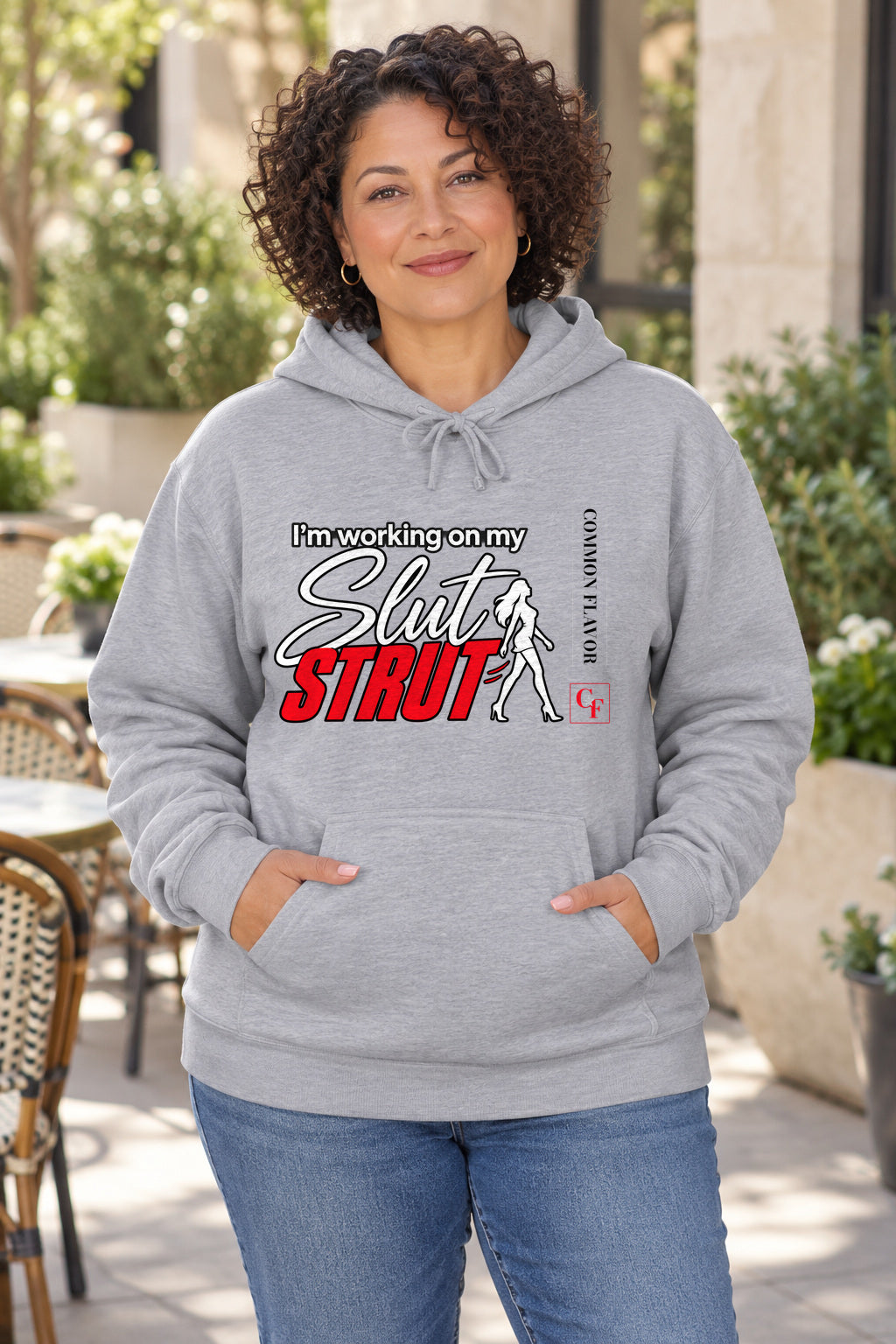 Slut Strut Variation Hoodie in Sport Grey on a model outdoors — Common Flavor