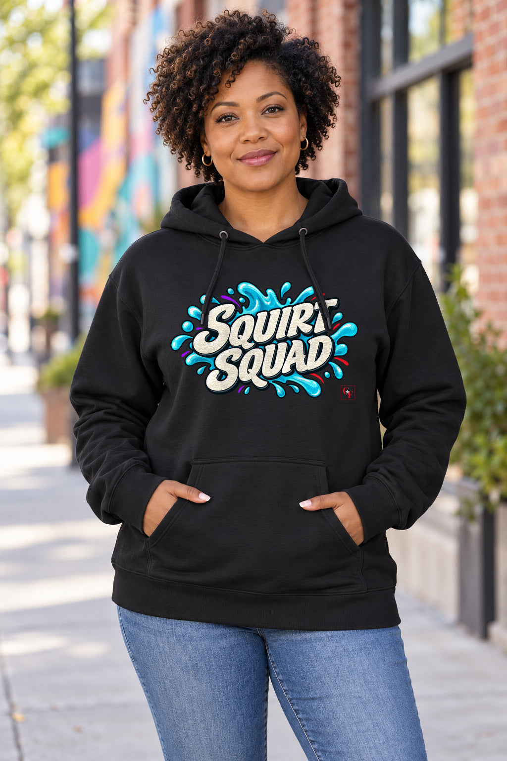 Squirt Squad Hoodie in Black on a model outdoors — Common Flavor