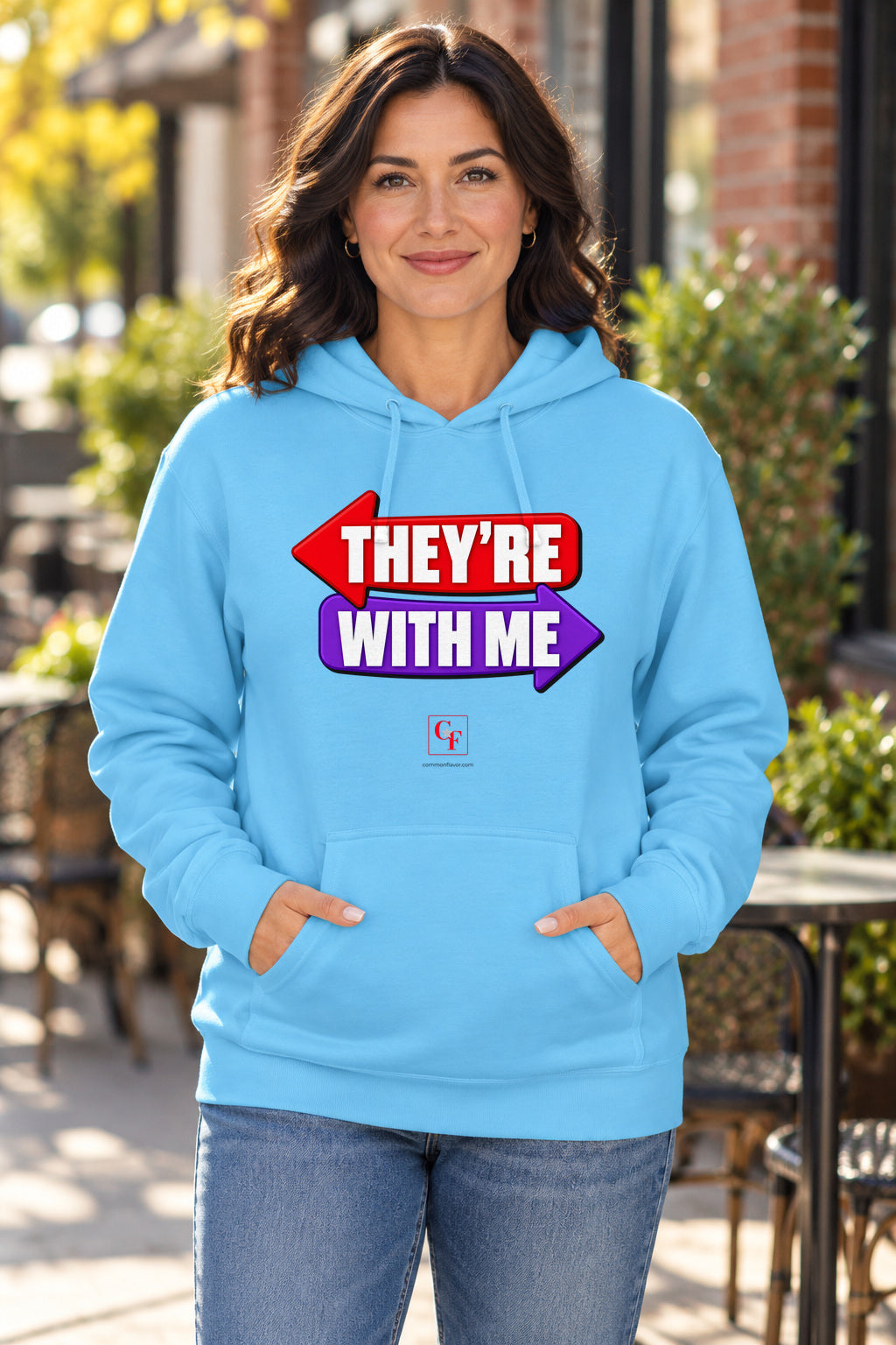 They're With Me Hoodie in Sky on a model outdoors — Common Flavor