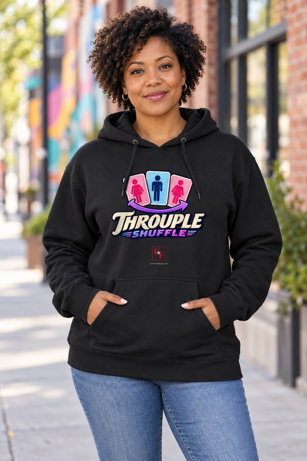 Throuple Shuffle Hoodie in Black on a model outdoors — Common Flavor