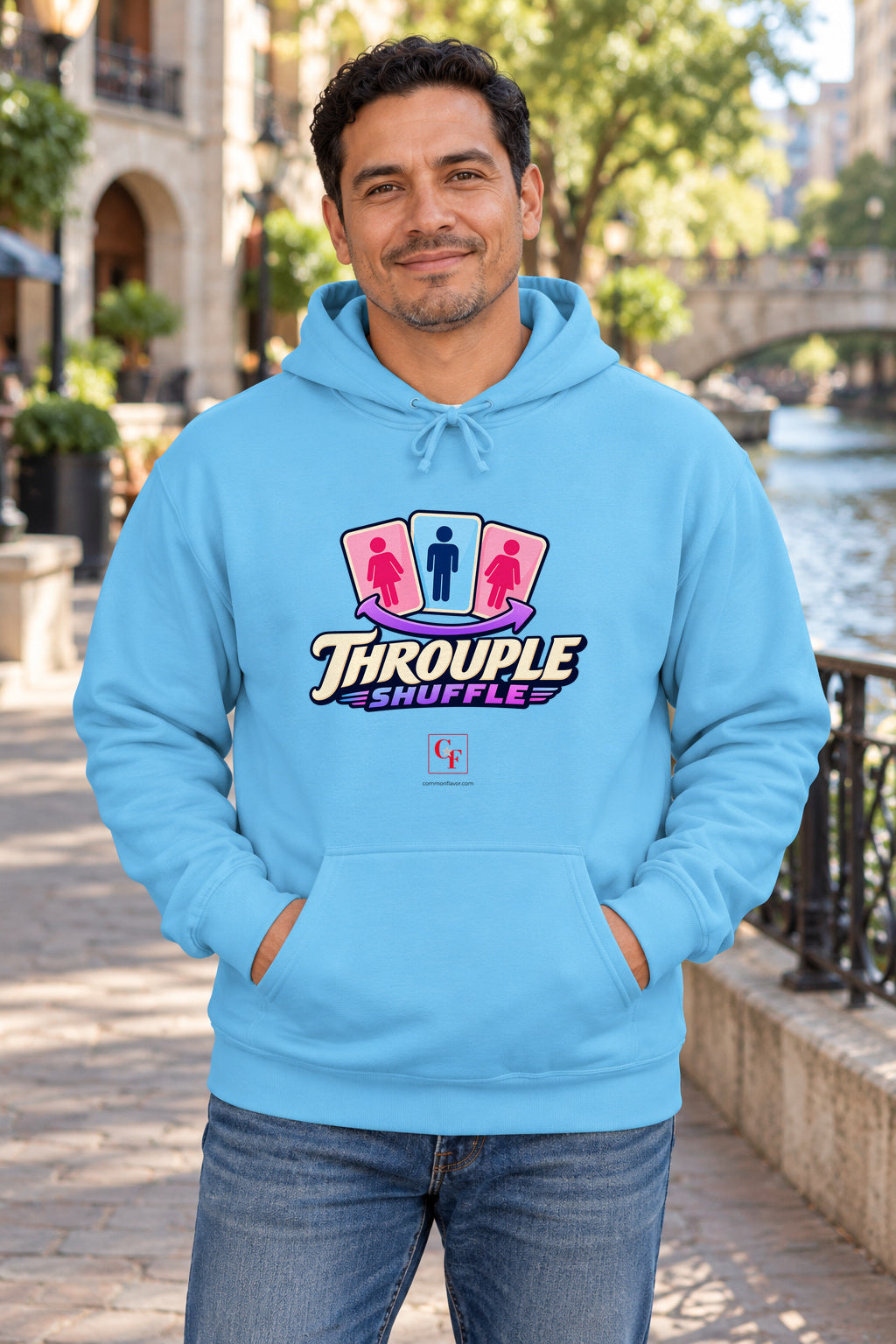 Throuple Shuffle Hoodie in Sky on a model outdoors — Common Flavor