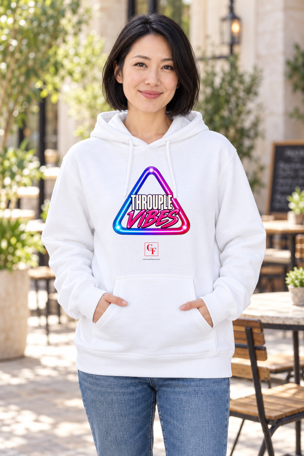 Throuple Vibes Hoodie in White on a model outdoors — Common Flavor